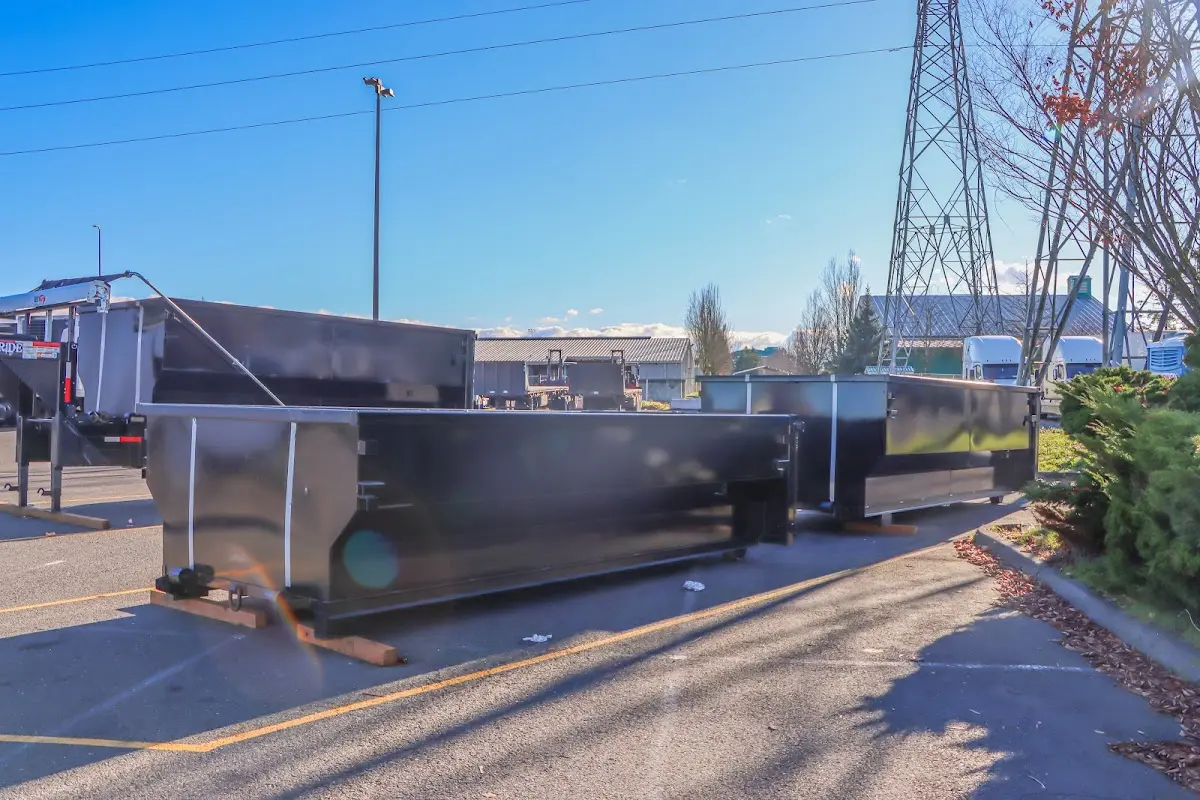 Roll-off dumpster ready for waste disposal at job site for 10 Yard Dumpster Rental in Rochester